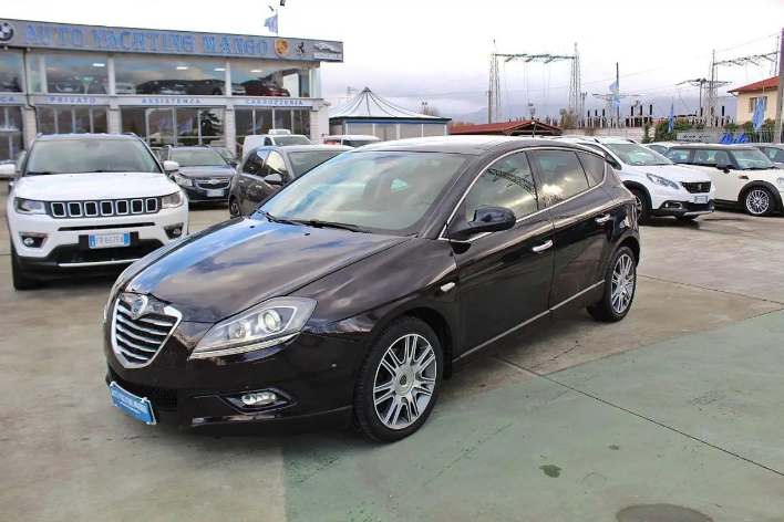 "Lancia Delta 1.9 MJT Twinturbo DPF Oro"