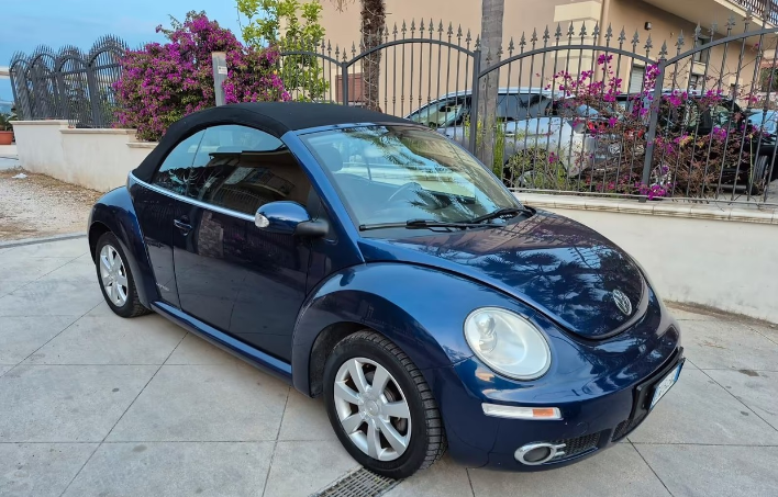 Volkswagen New Beetle 1.4 16V Cabrio - immagine 11